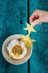 Directly above shot of hand holding ice cream