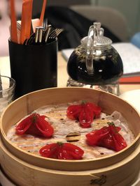 Close-up of strawberries in bowl on table