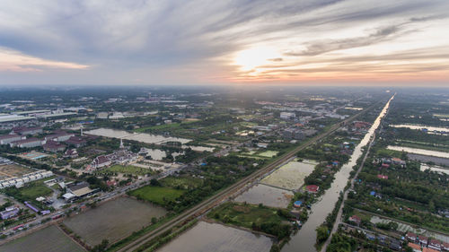 High angle view of cityscape against sky at sunset