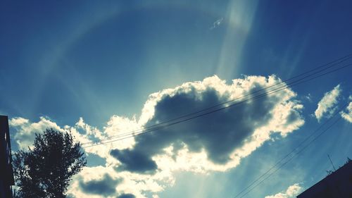 Low angle view of vapor trails in sky