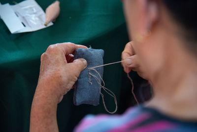 Close-up of hands working