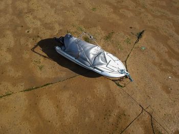 High angle view of shoes on sand