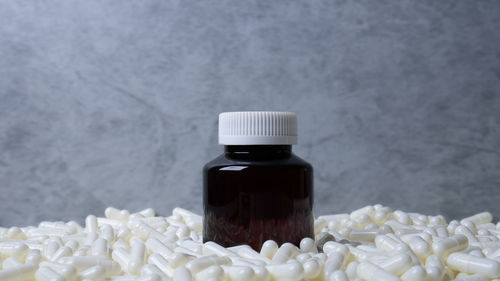 Close-up of glass bottle on table