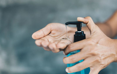 Close-up of man holding hands