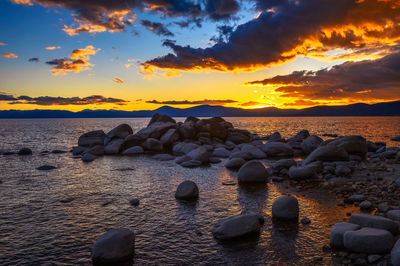 Scenic view of sea against sky during sunset