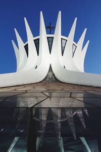 Low angle view of building against blue sky