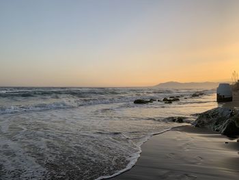 Scenic view of sea against sky during sunset