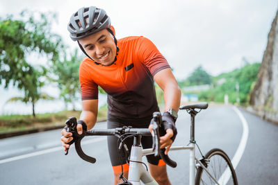 Man riding bicycle on street