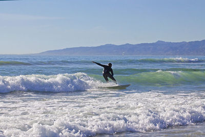 Man surfing in the sea