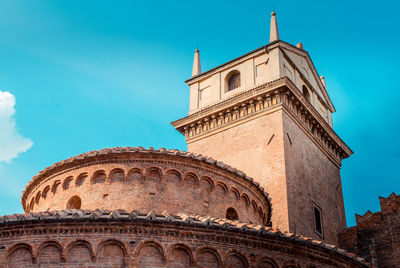 Low angle view of historical building against blue sky