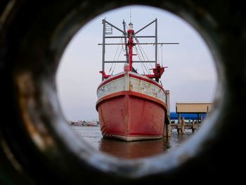 Ship in sea against sky
