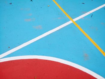 High angle view of markings on blue floor