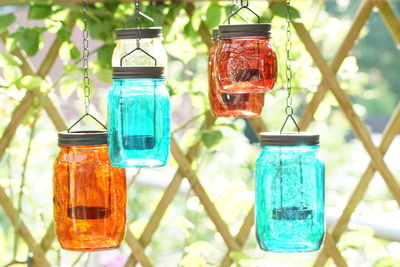 Close-up of lantern hanging in jar