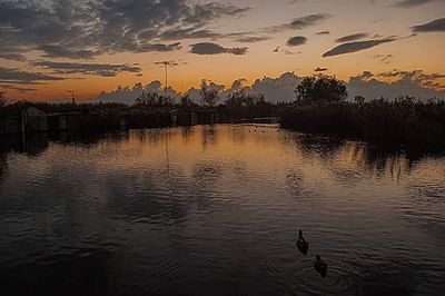 View of lake at sunset