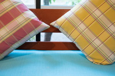 High angle view of empty chair on table