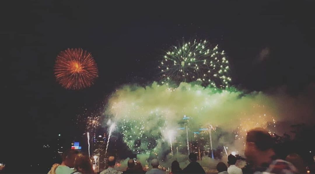 night, event, firework, firework display, illuminated, celebration, exploding, motion, arts culture and entertainment, long exposure, smoke - physical structure, glowing, blurred motion, group of people, firework - man made object, sky, crowd, large group of people, nature, light, outdoors, sparks, excitement