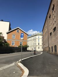 Low angle view of building against clear blue sky. scandinavian summer in oslo, norway.