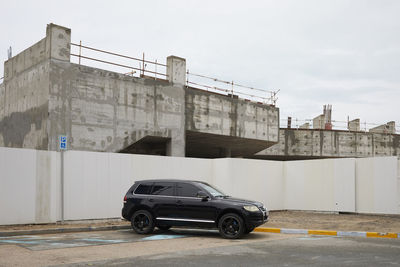 Cars on road against sky