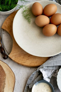 High angle view of eggs in bowl on table