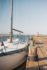 Boats moored at harbor