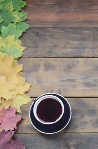 High angle view of coffee cup on table