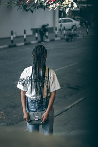 Woman standing on street