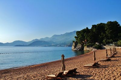 Scenic view of sea against clear blue sky