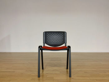 Empty chair on table at home