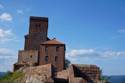 Low angle view of historic building against sky