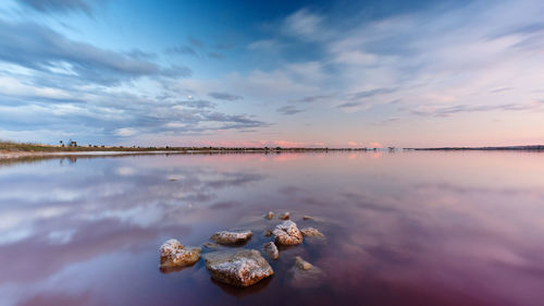 Scenic view of sea against sky during sunset