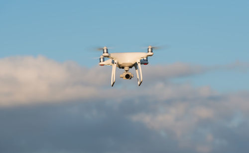 Low angle view of camera against sky