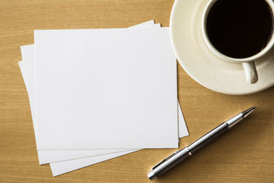 High angle view of coffee cup on table