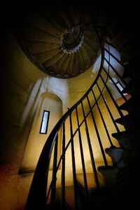 Low angle view of spiral staircase in building