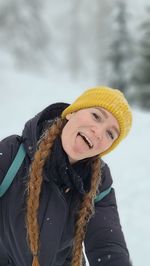 Portrait of a smiling young woman in winter