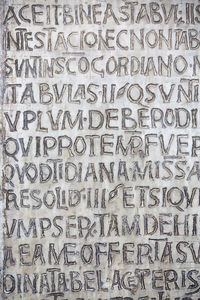 Text on brick wall