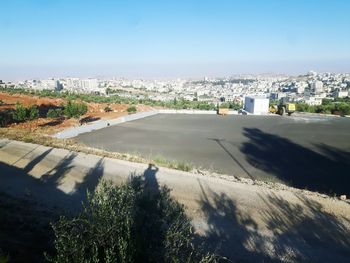 View of cityscape against clear sky