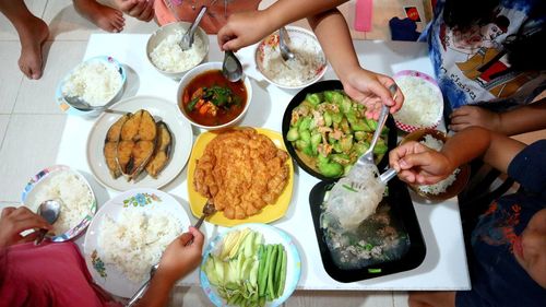 High angle view of people eating food