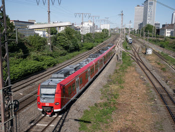Train on railroad tracks against sky