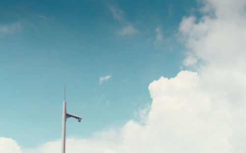 Low angle view of airplane against sky