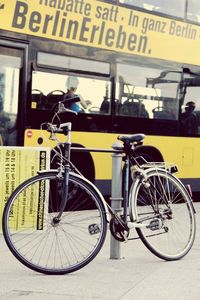 Bicycle parked on street in city