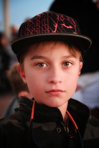 Portrait of cute boy standing outdoors