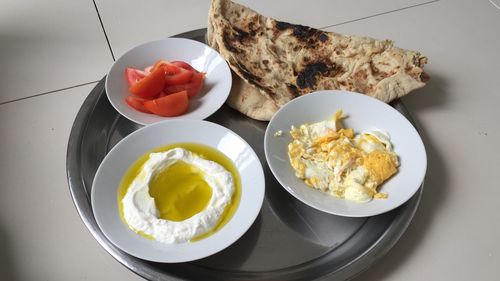 High angle view of breakfast served on table