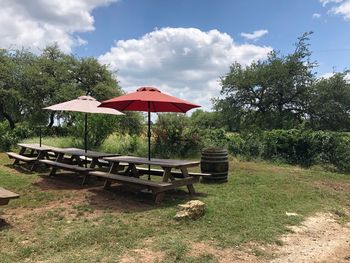 Built structure on field against sky