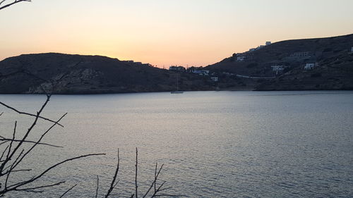 Scenic view of sea against clear sky during sunset