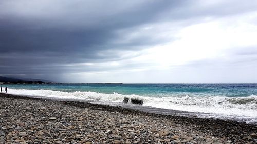 Scenic view of beach against sky