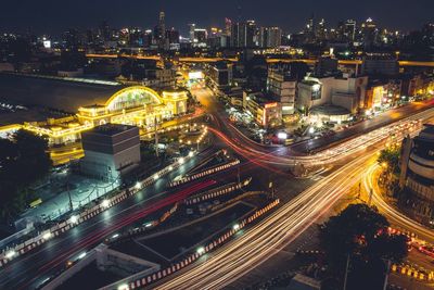 High angle view of illuminated cityscape at night