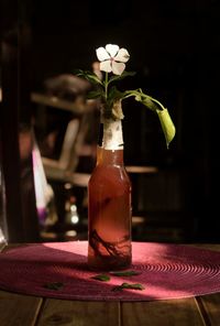 Little flower in a glass bottle