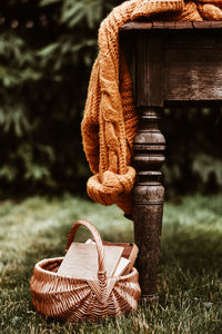 Close-up of machine in basket on field