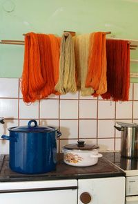 Clothes hanging on wall at home