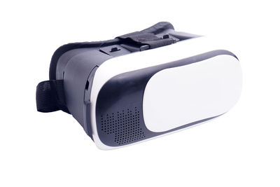 Close-up of camera over white background